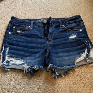 American Eagle distressed hem dark wash midi short